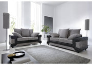 Modern living room with gray sofa set and decorative elements.