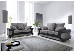 Modern living room with gray sofa set and decorative elements.