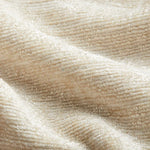 Close-up of beige textured fabric