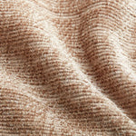 Close-up of beige textured fabric